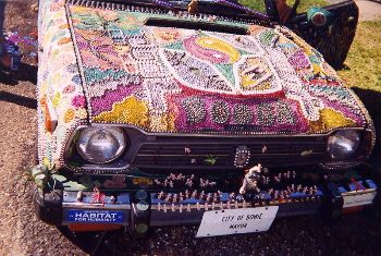 Featured is a photo of a cool art car ... cartist and photographer unknown.